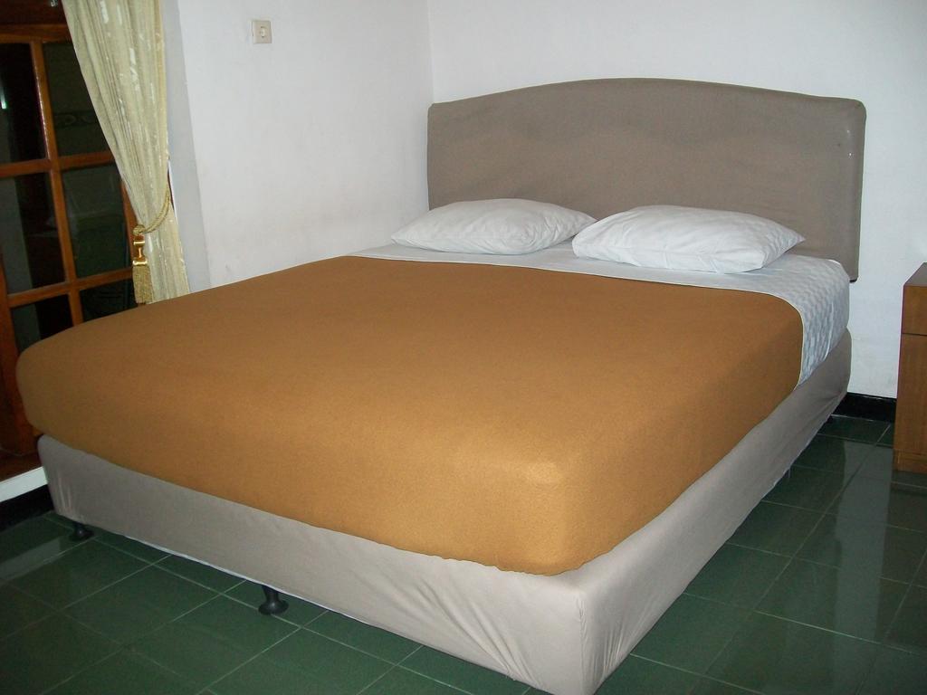 Krowi Inn Surabaya Quarto foto